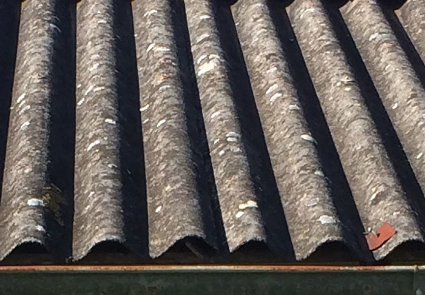 A close up of old Asbestos roof tiles.
