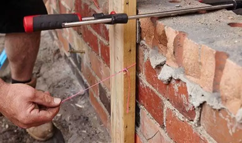 The bricklaying training course is happening at a construction site in Sydney.