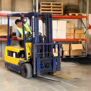 A trainee taking a forklift training course at DLI training to obtain a forklift training license in Sydney.